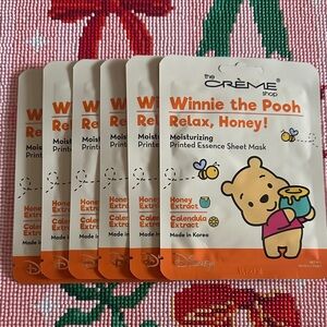 The creme shop x Winnie The Pooh sheet masks